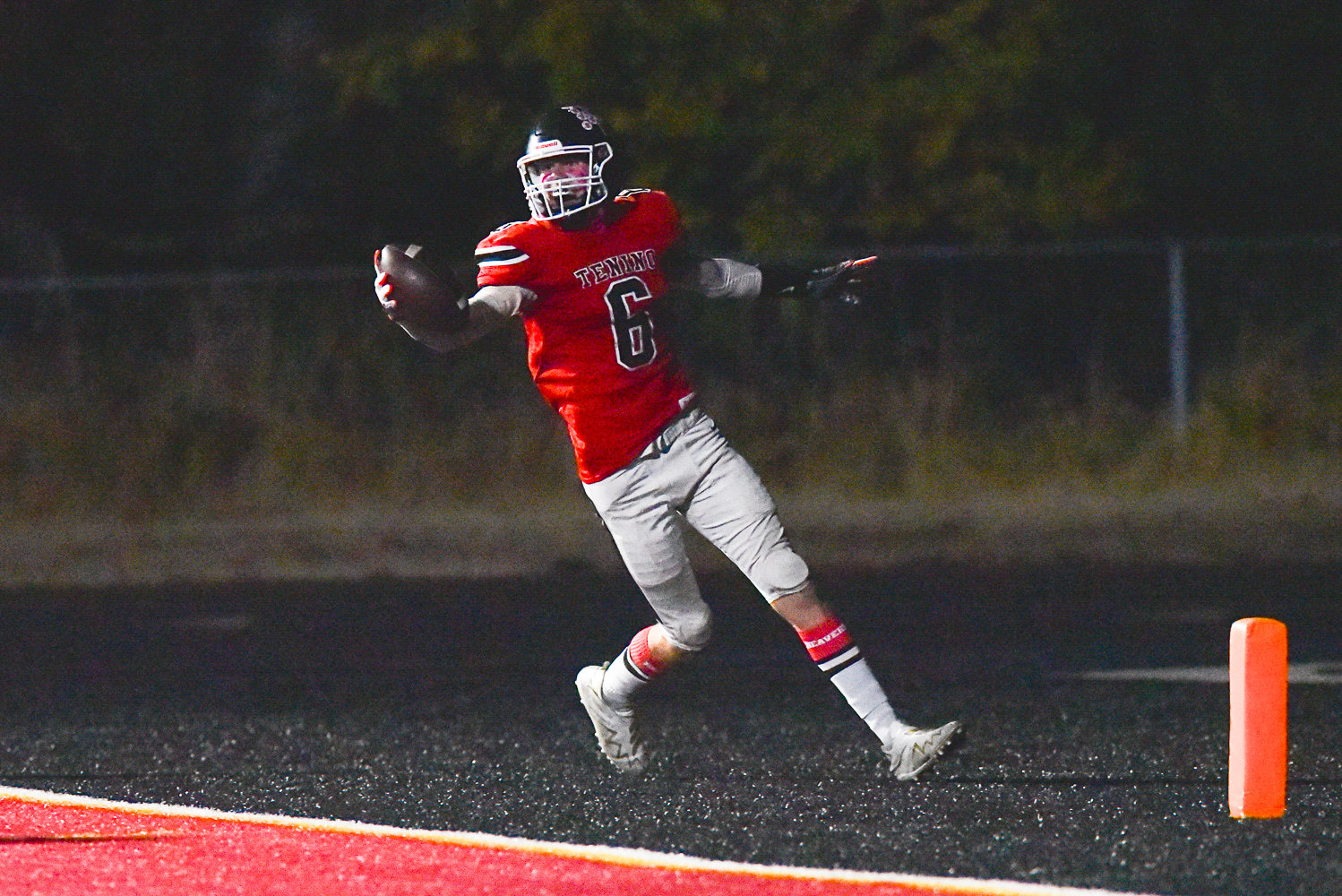 Max Craig celebrates after scoring a touchdown in the third quarter of Tenino's 66-26 win over Elma on Oct. 14.