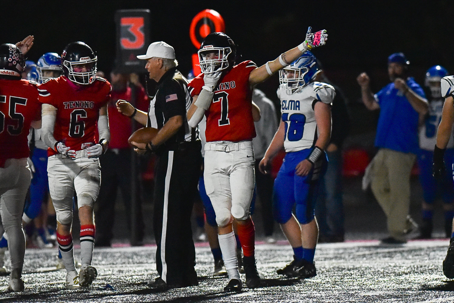 Kysen Knox points which way the ball is headed after Tenino recovered a fumble in the second half of its win over Elma at home on Oct. 14.