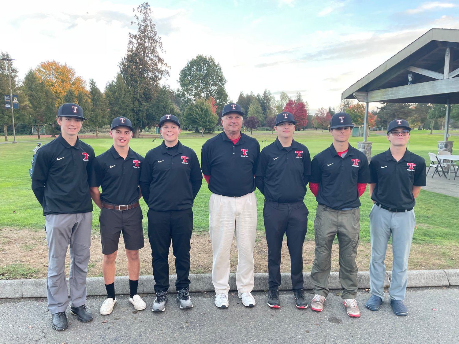 The Tenino boys golf team poses at Tumwater Valley Golf Course at the 1A District 4 Championships Oct. 24. From left to right are Preston Snider, Carson Hart, Jaxson Gore, coach Del Sandberg, Ethan Baxter, Easton Snider, and David Dallaire.