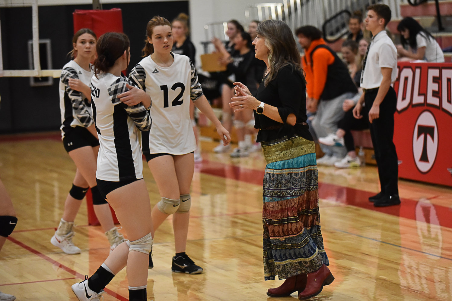 Toledo coach Kelli Larson talks to her team after callng a timeout during the Riverhawks' match against Napavine on Oct. 24.