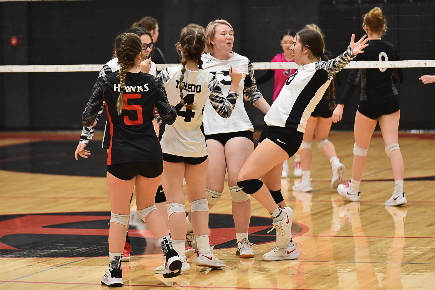 Toledo celebrates a point during its match against Napavine at home on Oct. 24.