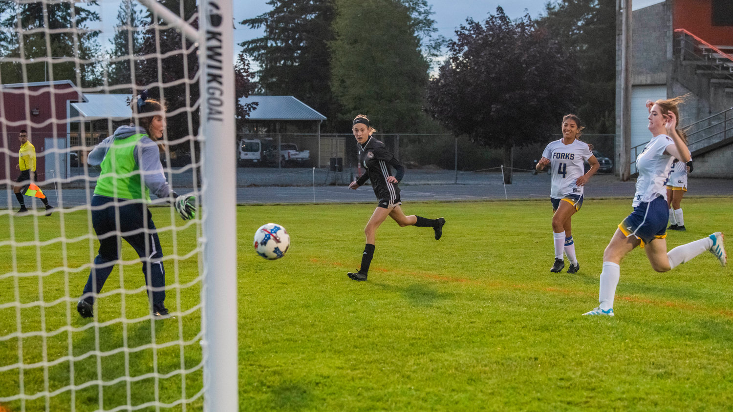 Napavine sophomore Grace Pancake (4) watches as her shot bounces into the goal for a goal on Oct. 23.