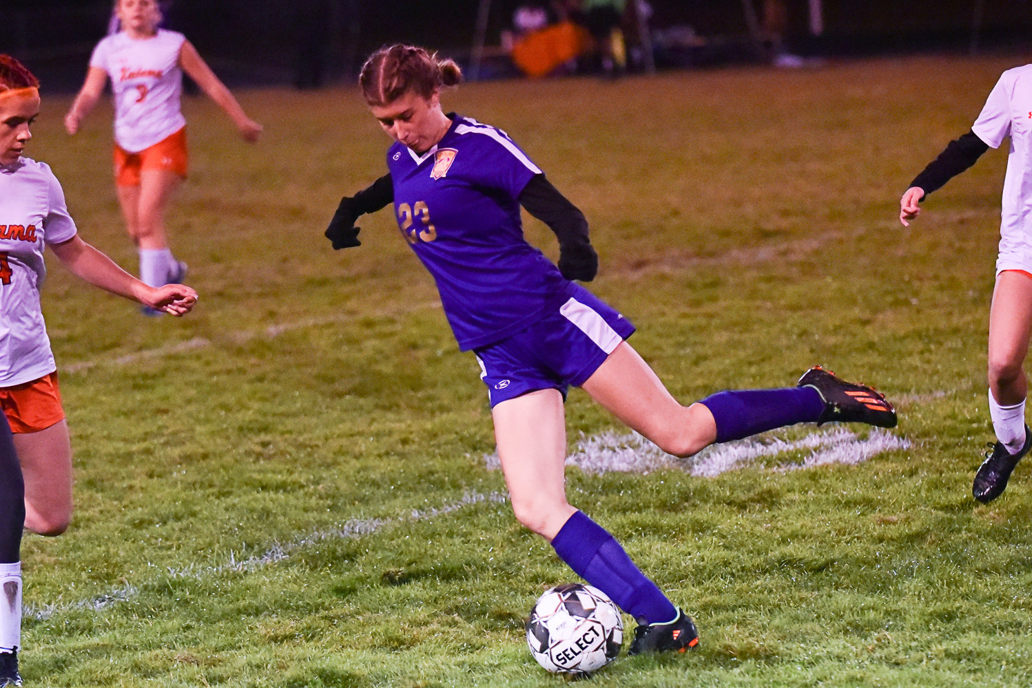 Sylvie Little tries to take on a defender during Onalaska's match against Kalama on Oct. 26.