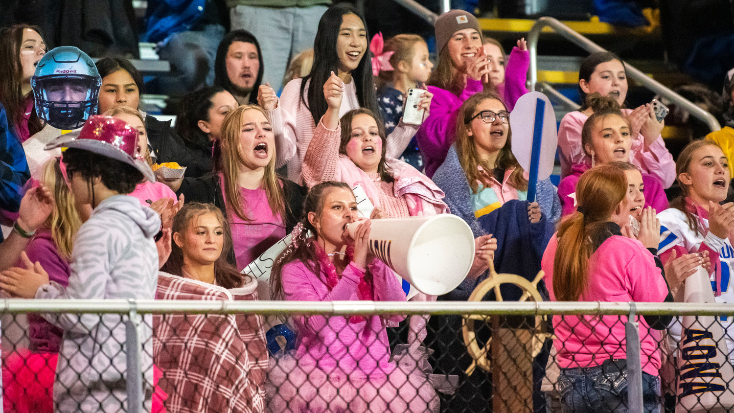 Pirate fans cheer during a game Thursday night in Adna.