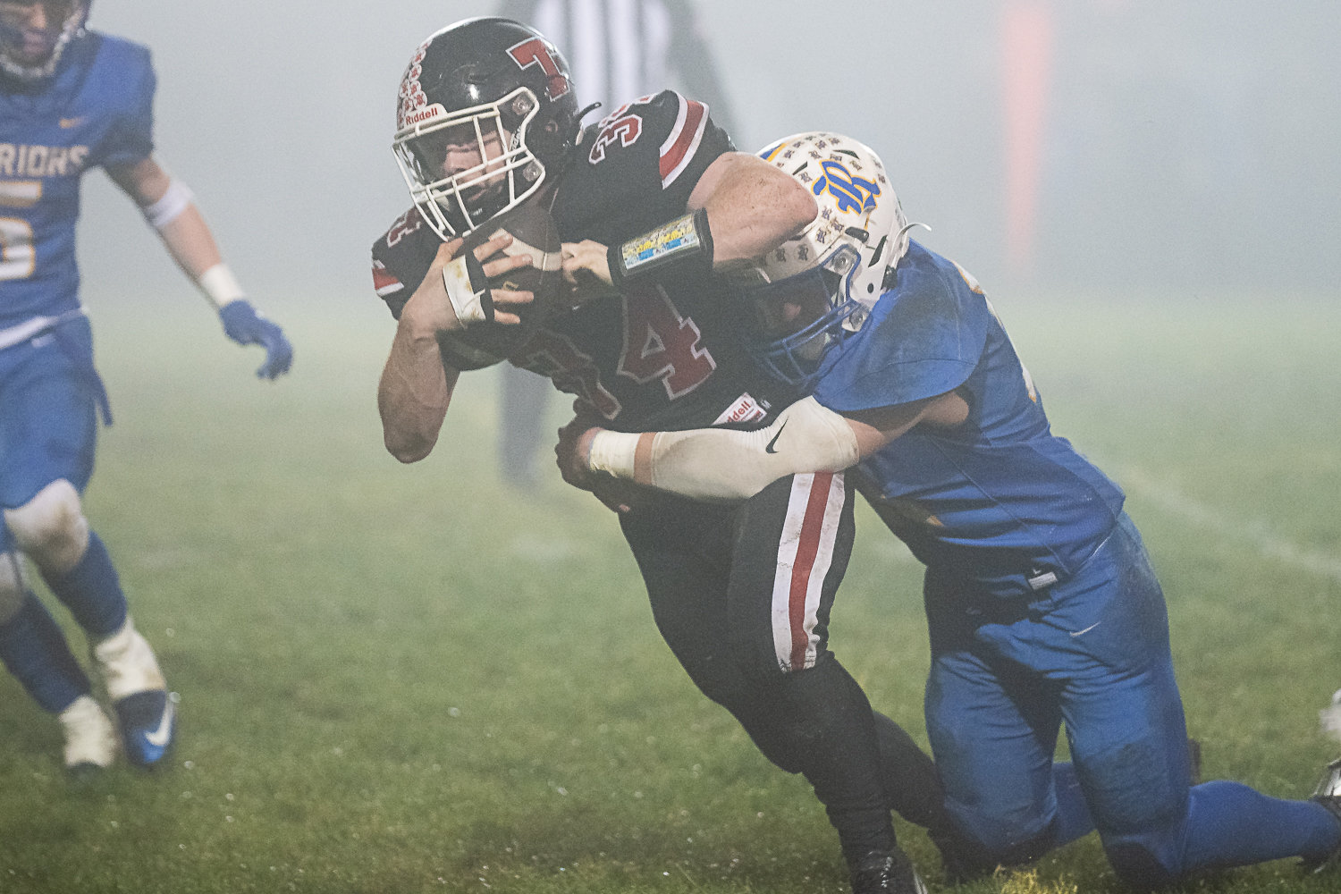Tenino's Randy Marti blows through a tackler against Rochester in the Scatter Creek Showdown Oct. 28.