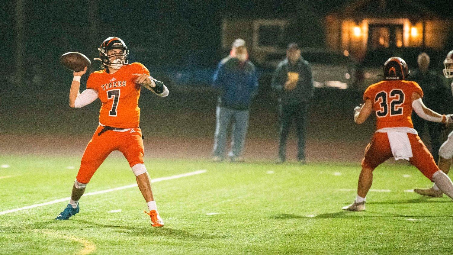 Centralia senior Tommy Billings (7) looks to pass Friday night during a game at Tiger Stadium.