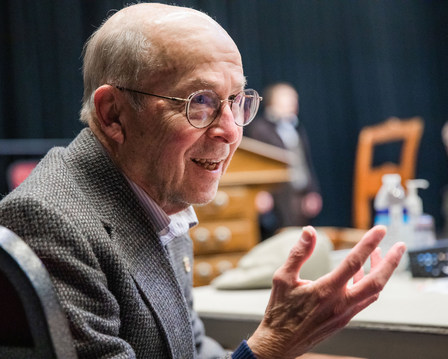 John Pratt, a professor emeritus at Centralia College, smiles while talking about his work writing “Leaving 50 Wimpole Street” Thursday afternoon inside the Phillip Wickstrom Studio Theatre.