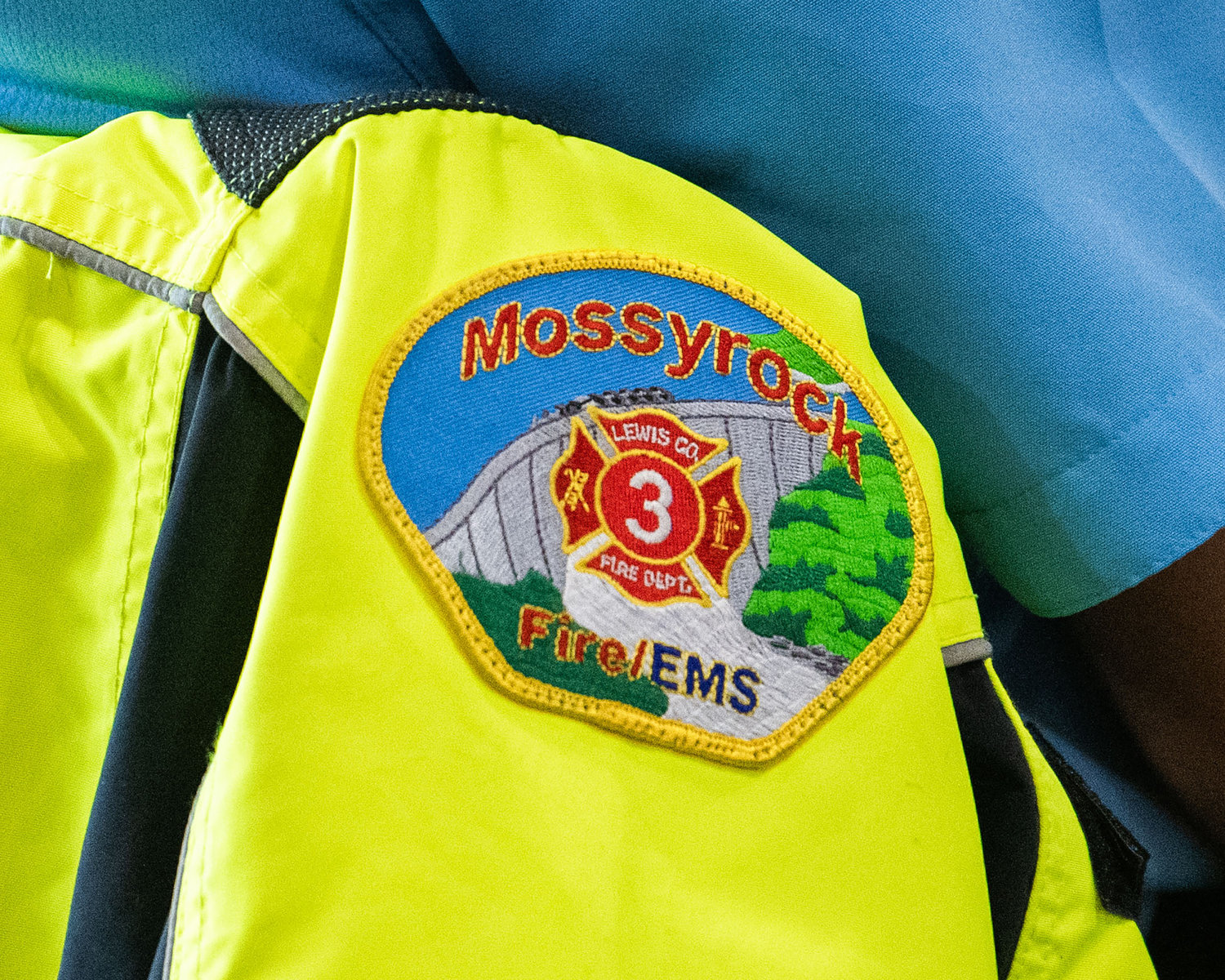 A Mossyrock Fire/EMS patch features an embroidered image of the Mossyrock Dam seen at the annual flood meeting in Chehalis on Thursday.