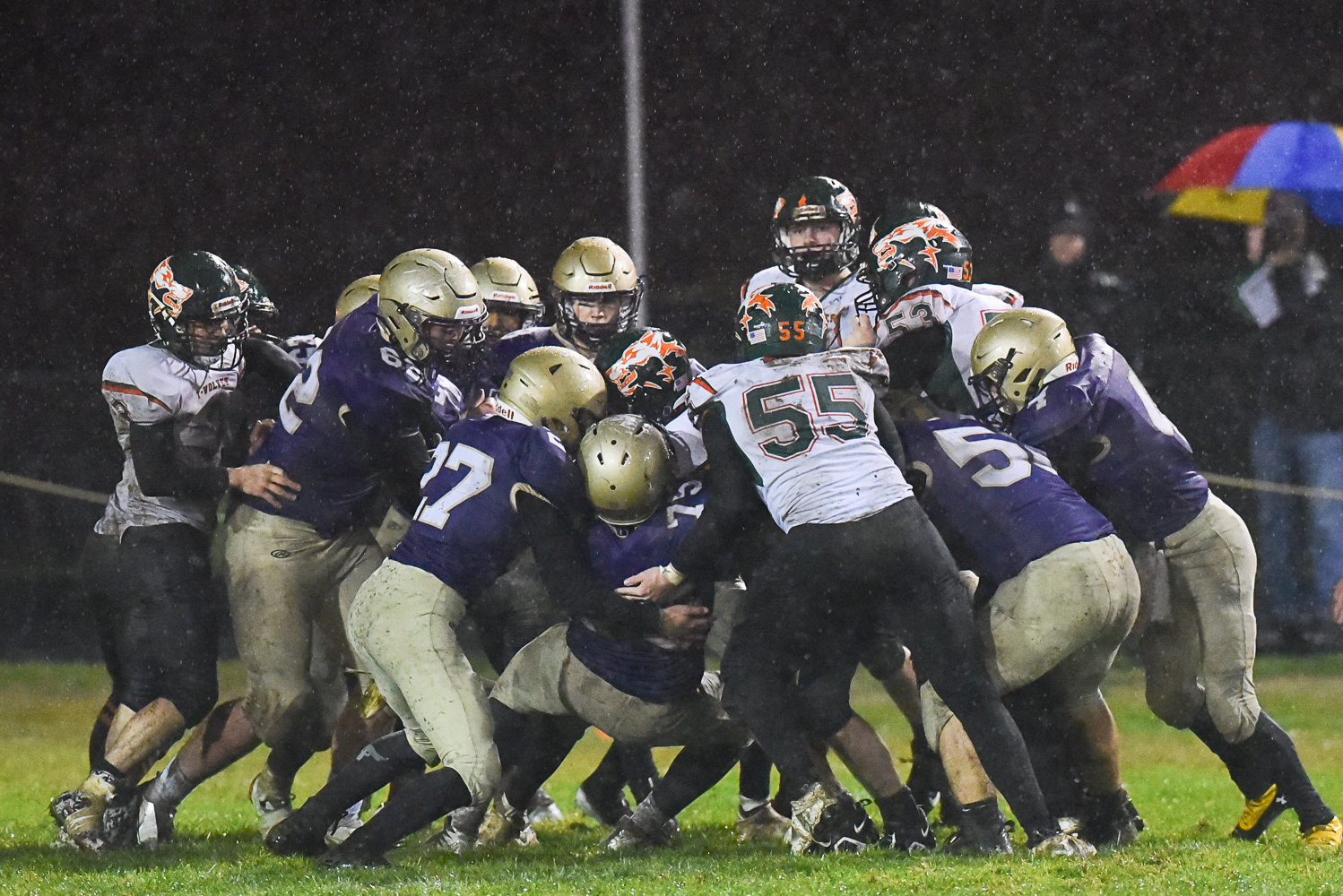 A mass of humanity tries to push the pile during Onalaska's 26-8 win over MWP on Nov. 4.