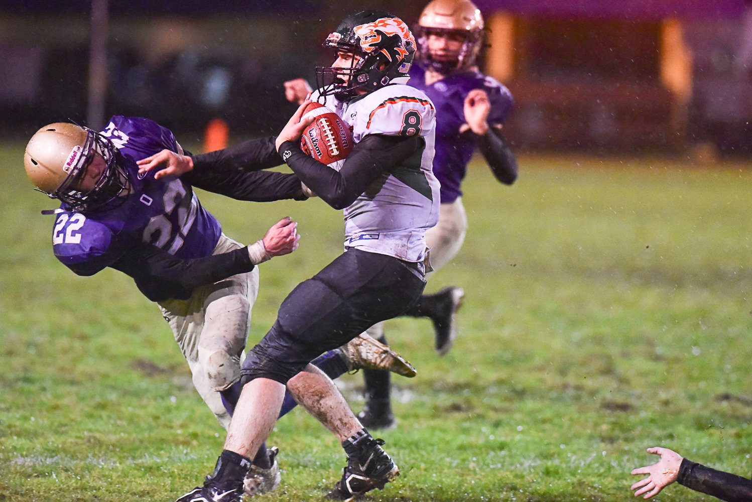 MWP tailback Carter Dantinne ties to throw off Onalaska's Sam Pannkuk during the Loggers' 26-8 win over the T-Wolves in a district crossover on Nov. 4.
