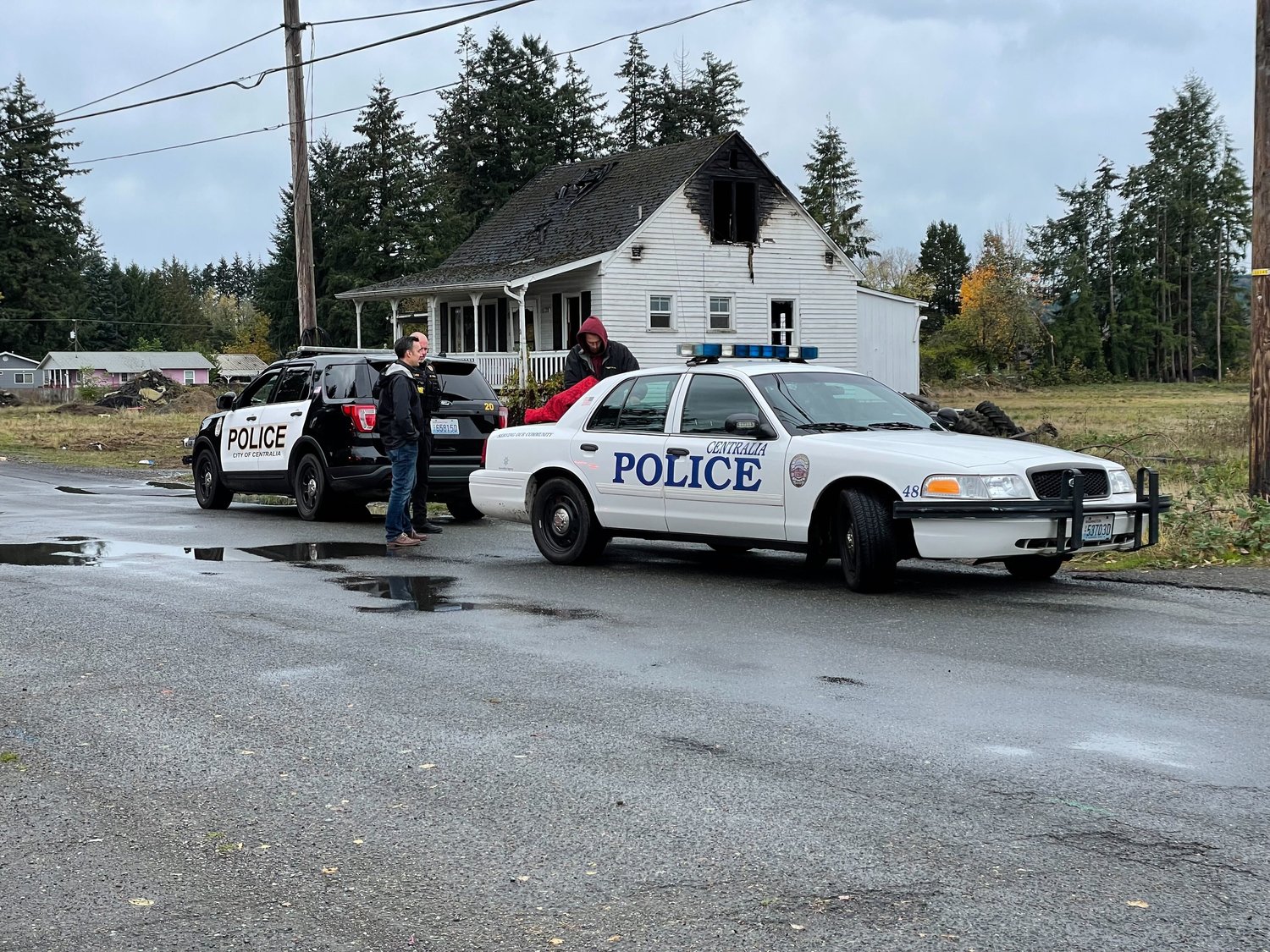 Centralia police respond to a fire in Centralia on Sunday morning.