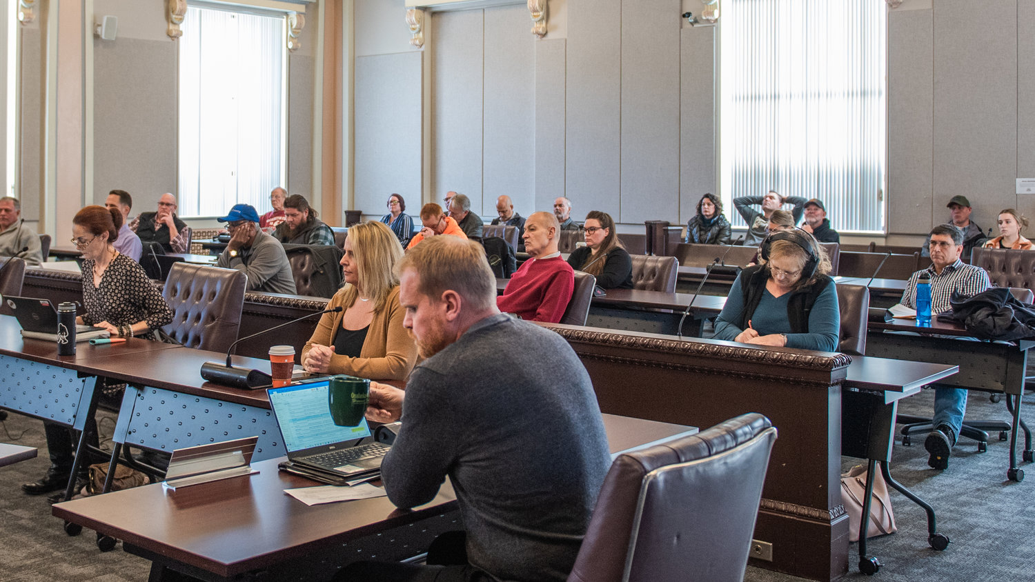 The Lewis County Courthouse Commissioners’ Hearing Room is filled with citizens and county staff on Tuesday morning as the county votes on changes to its comprehensive plan.