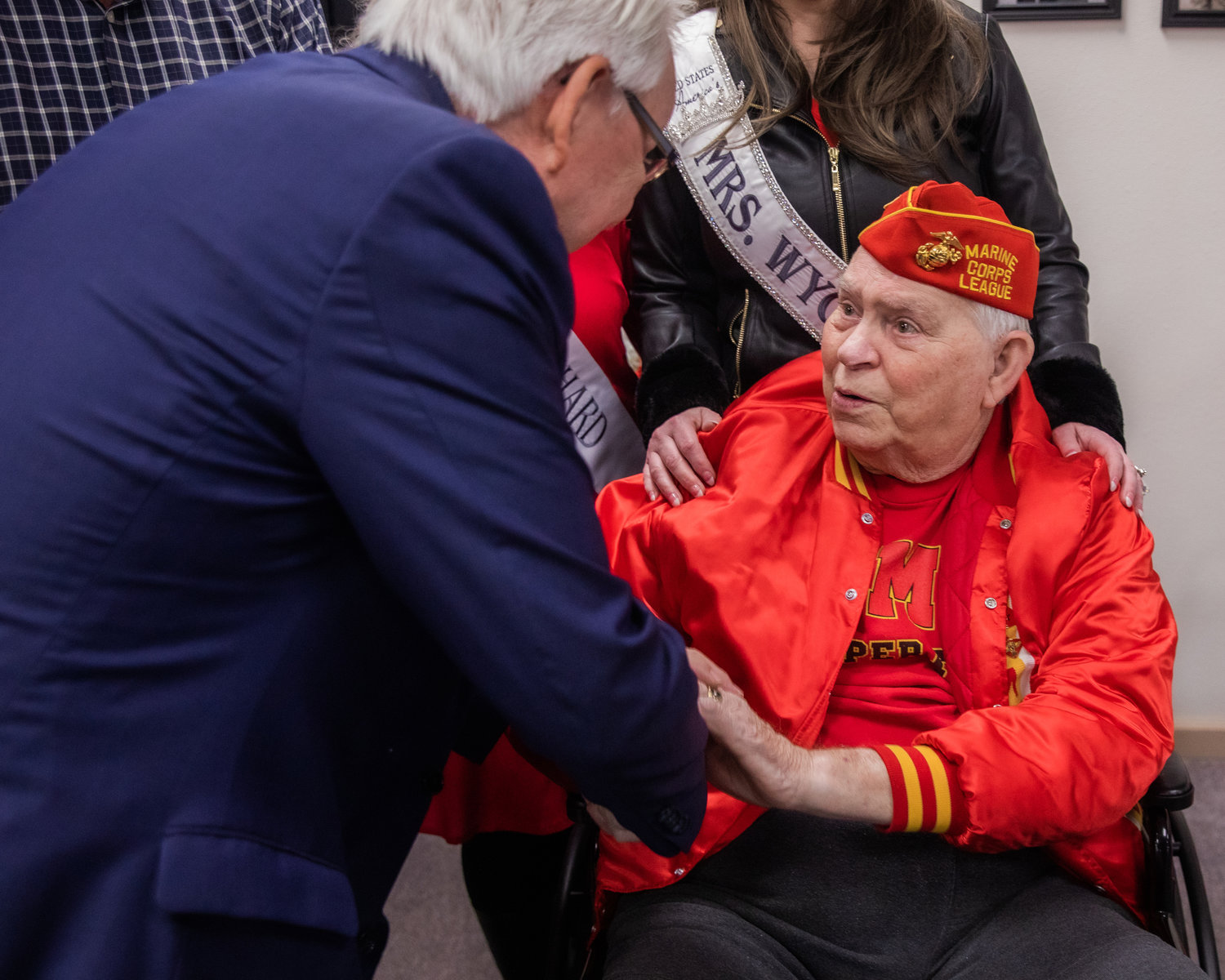 Lee Grimes, left, shakes the hand of Jack Williams, a Marine, on Veterans Day during the 25th anniversary of the Veterans Memorial Museum in Chehalis.