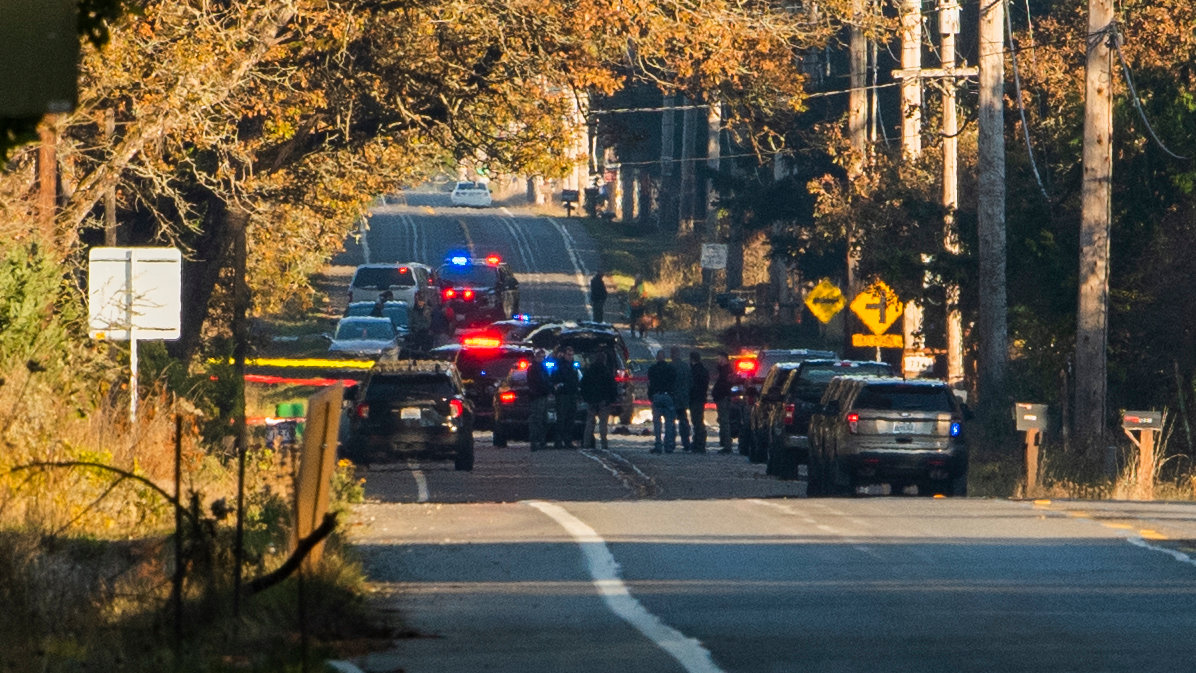 Law enforcement vehicles block Old Highway 99 SE near Oak Drive SE in Tenino in November while investigating the scene of an officer involved shooting.