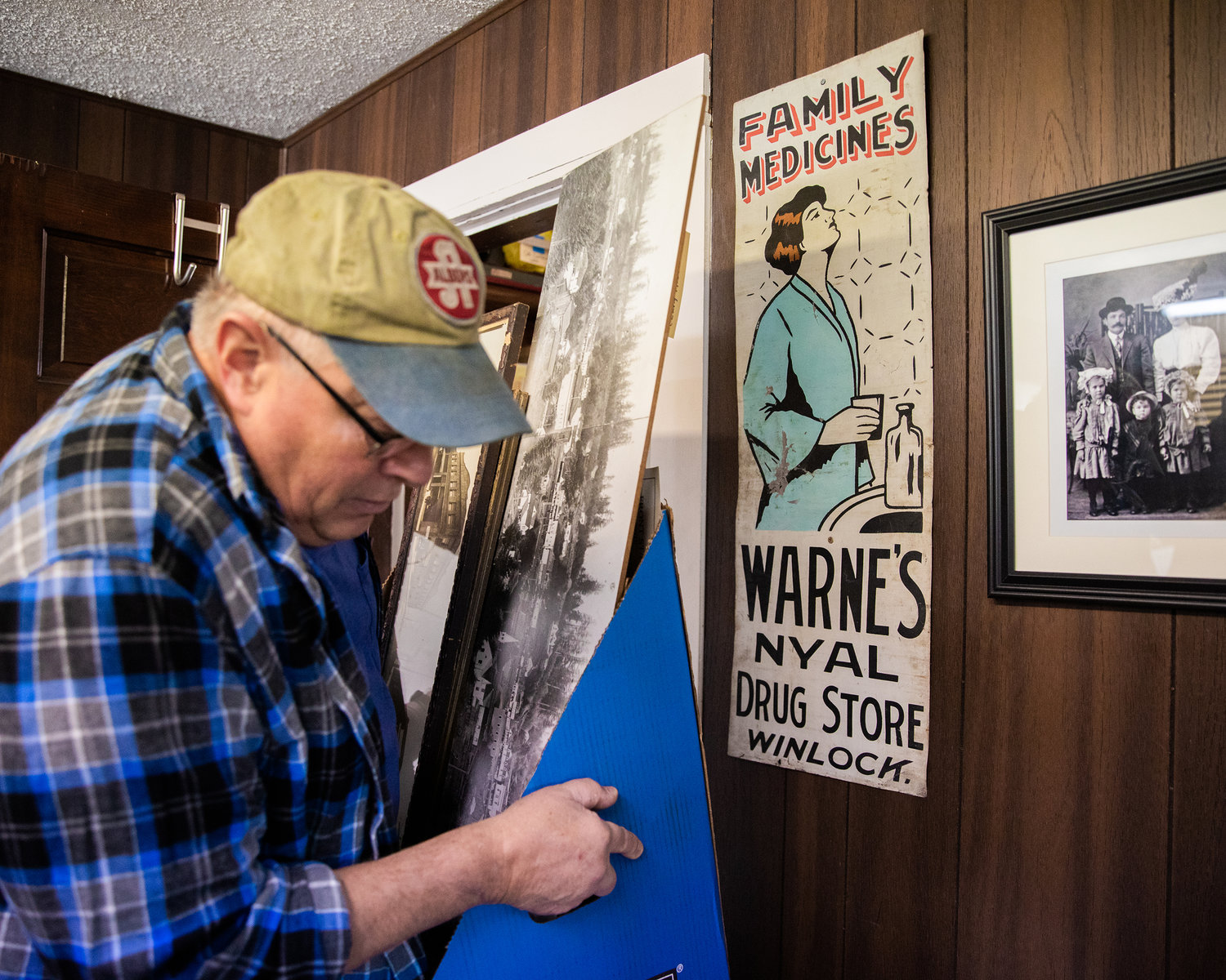 A sign from the Warne’s Nyal Drug Store hangs on display inside the Winlock Historical Museum.