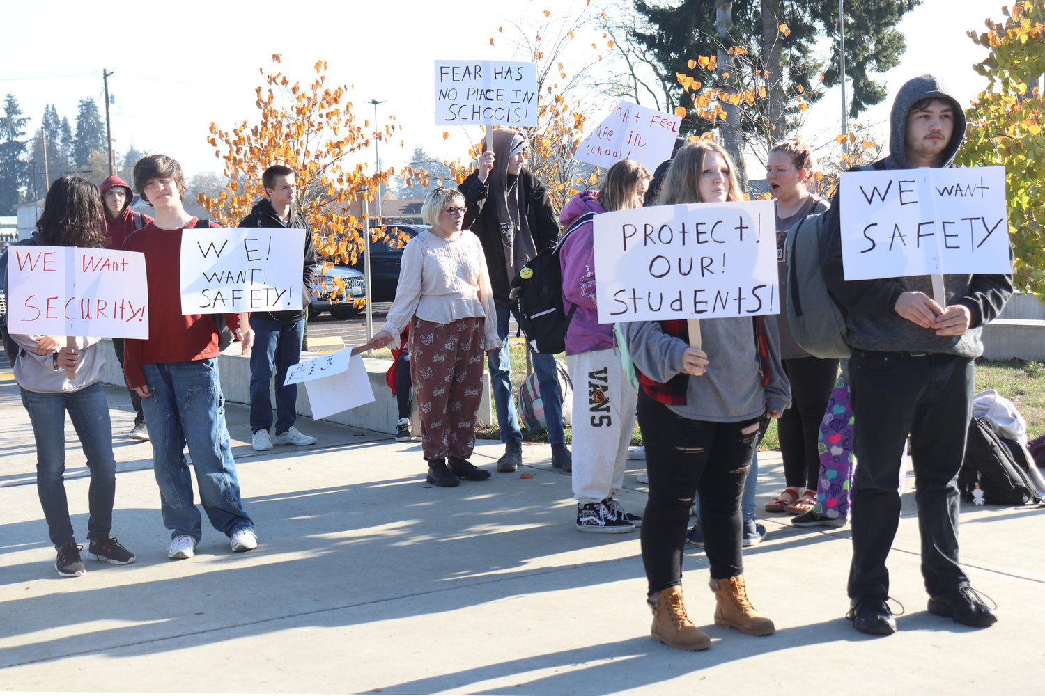Centralia High School students protest outside the school building over safety and security concerns on Thursday. The protest was organized by senior Dante Higgens, front right, and sophomore Erron Paul, to Higgens’ left.