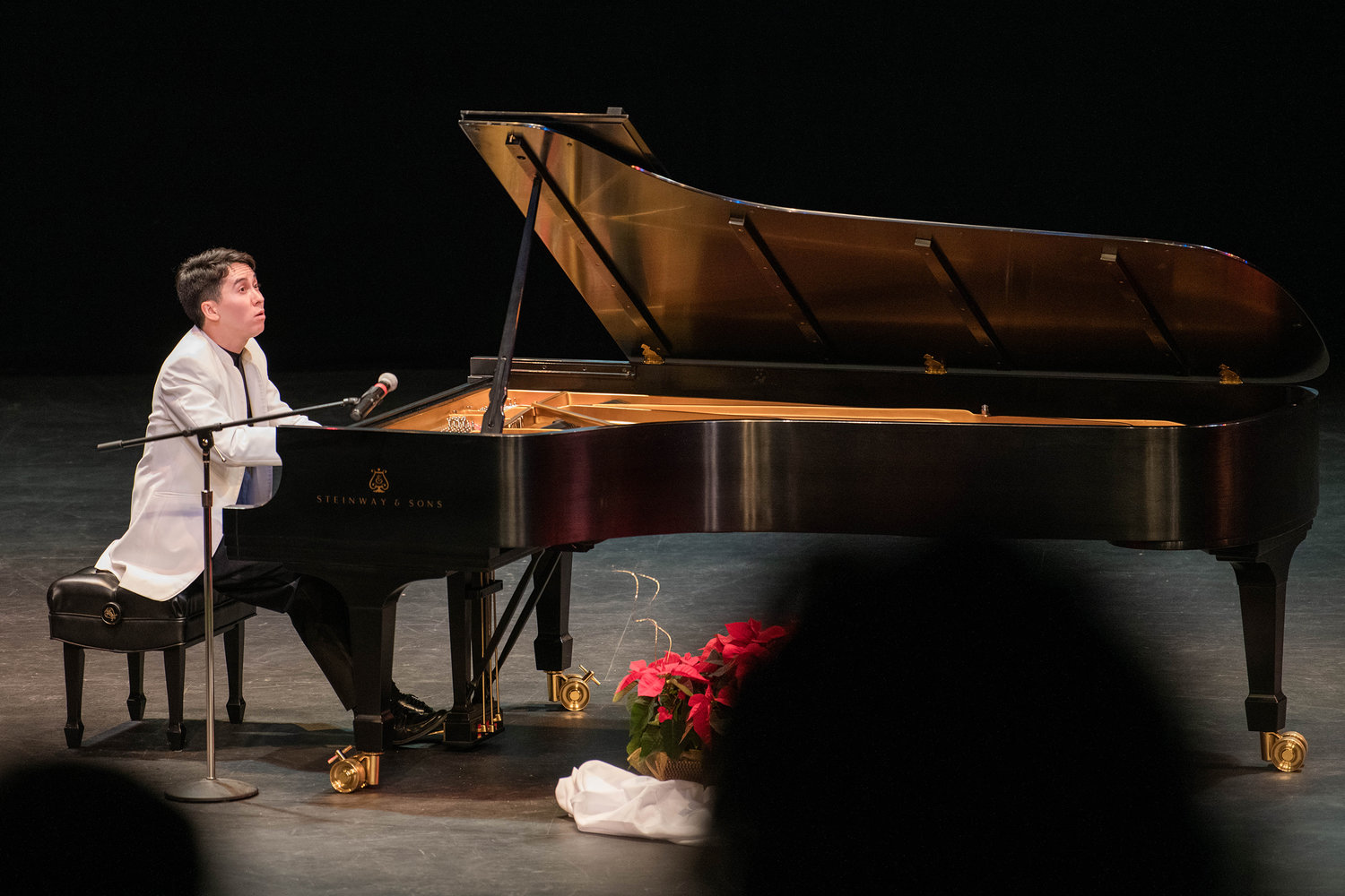 Charlie Albright performs for an audience on a nine-foot Steinway & Sons grand piano inside the Corbet Theatre Friday evening with proceeds going to the Charlie Albright Scholarship at Centralia College.
