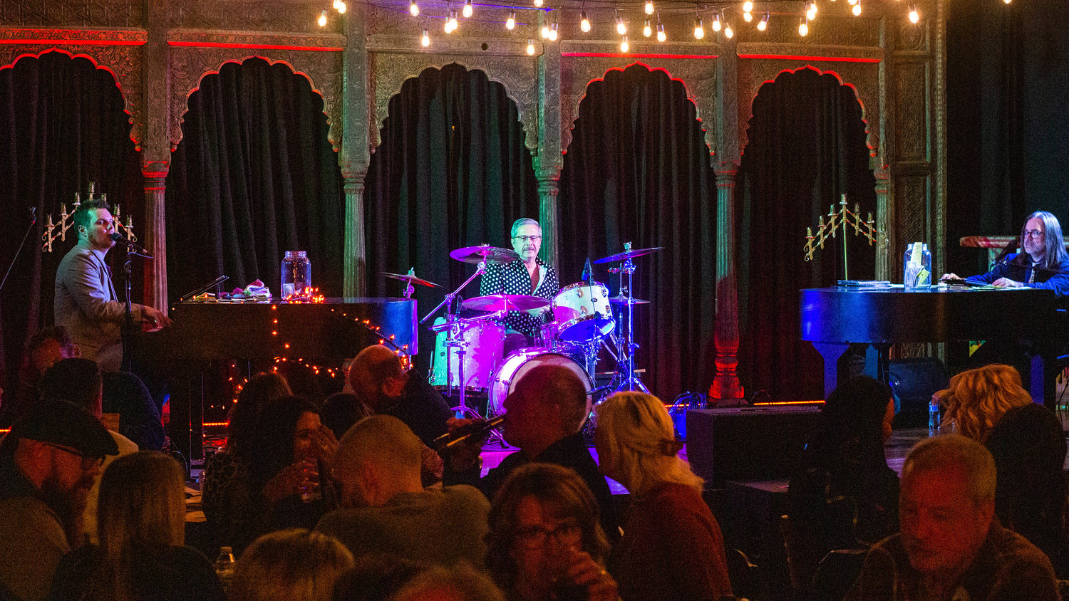 Dueling pianos perform during a Harmonies for Hope event raising money for the Boys and Girls Club of Lewis County at City Farm Chehalis. They are set to perform again at The Loft in Chehalis on Dec. 2.