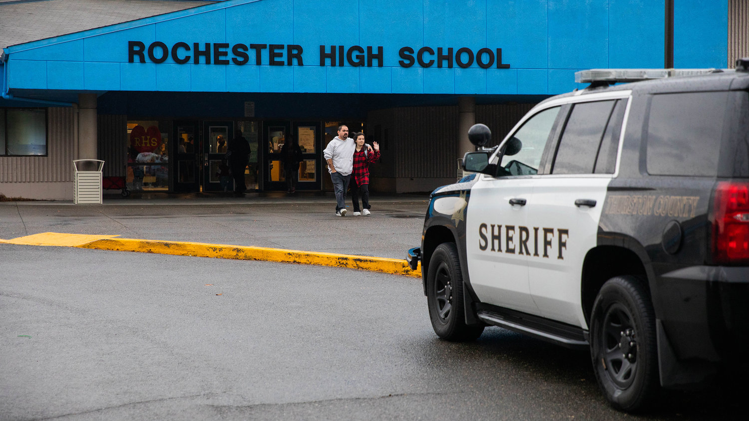 Parents take students out of class following a large police presence at Rochester High School where members of the Thurston County Sheriff’s Office were investigating a threat Tuesday morning.