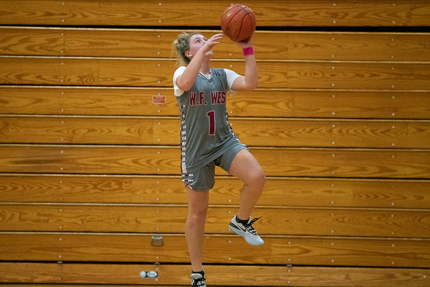 W.F. West guard Lena Fragner rises for a layup at a practice Nov. 22.