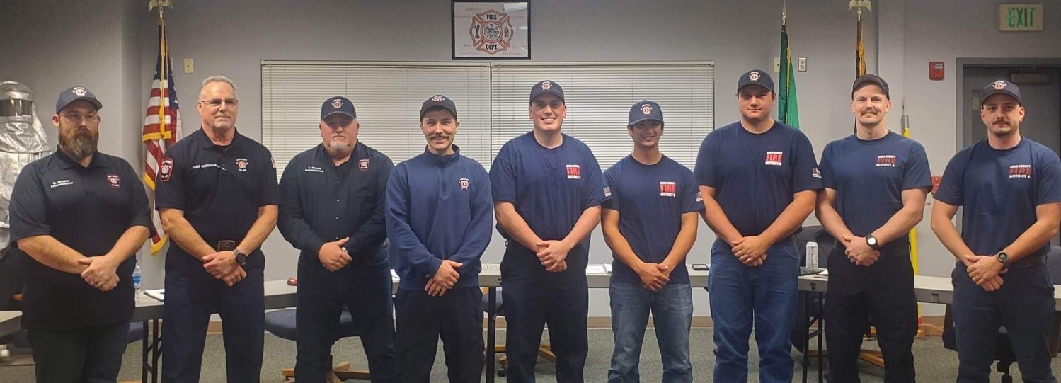 From left are Commissioner Greg Greene, Fire Chief Ken Cardinale, Board Chair Colin Mason and recruit graduates Mackenzie Kukas, Colten Whiting, Trevor Minkoff, Pete Harris, Aaron Boyle and Dayce Childress.