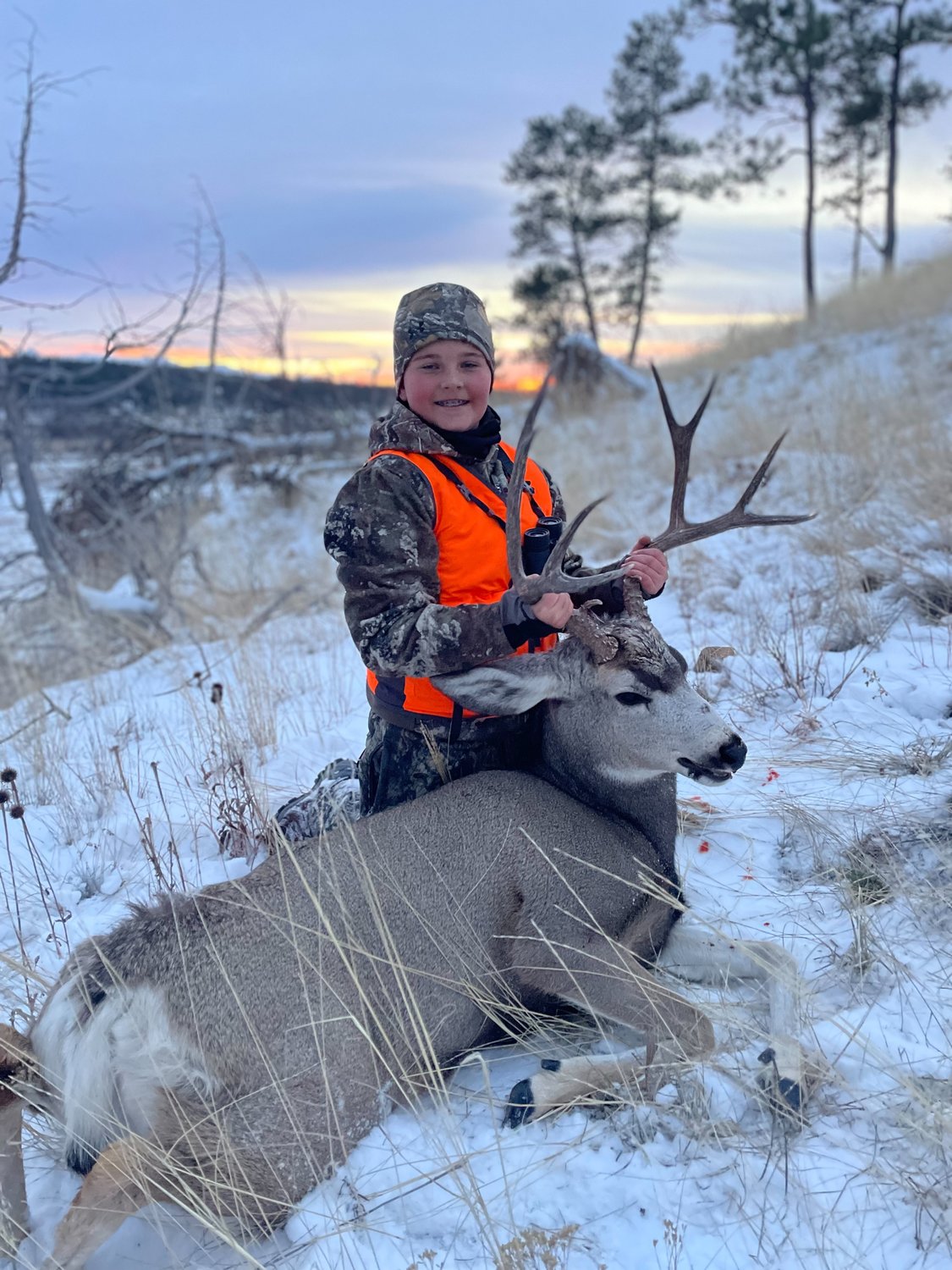 “Hunter Riley 12, of Chehalis, hunted for six days in eastern Montana before he found the mule deer buck he wanted.” — submitted by Christina Riley