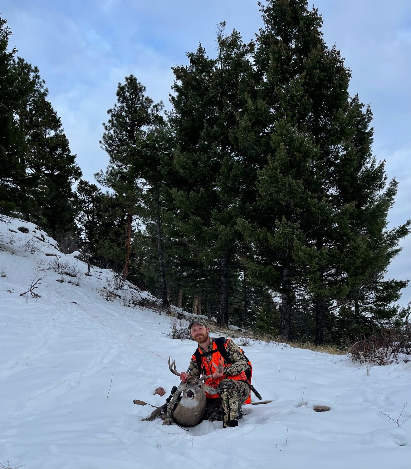 "Cody Phillips, a Chehalis resident and Centralia city letter carrier, shot this buck at 353 yards in western Montana on Nov. 22." — submitted by Matthew Phillips