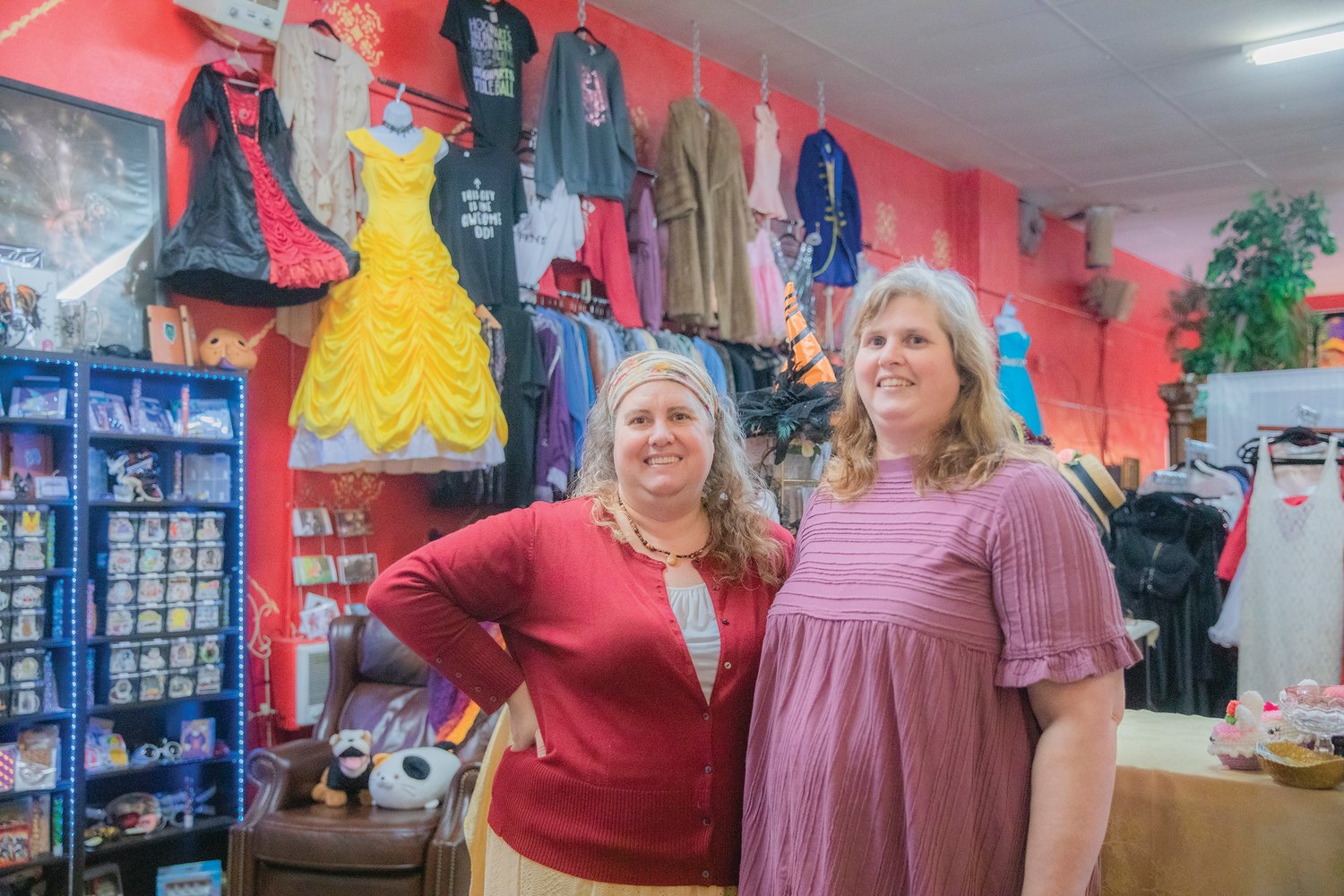 Christy Lakin and Lisa Smith smile for a photo inside The Victorian Showcase and Steampunk Emporium in downtown Centralia on Friday.