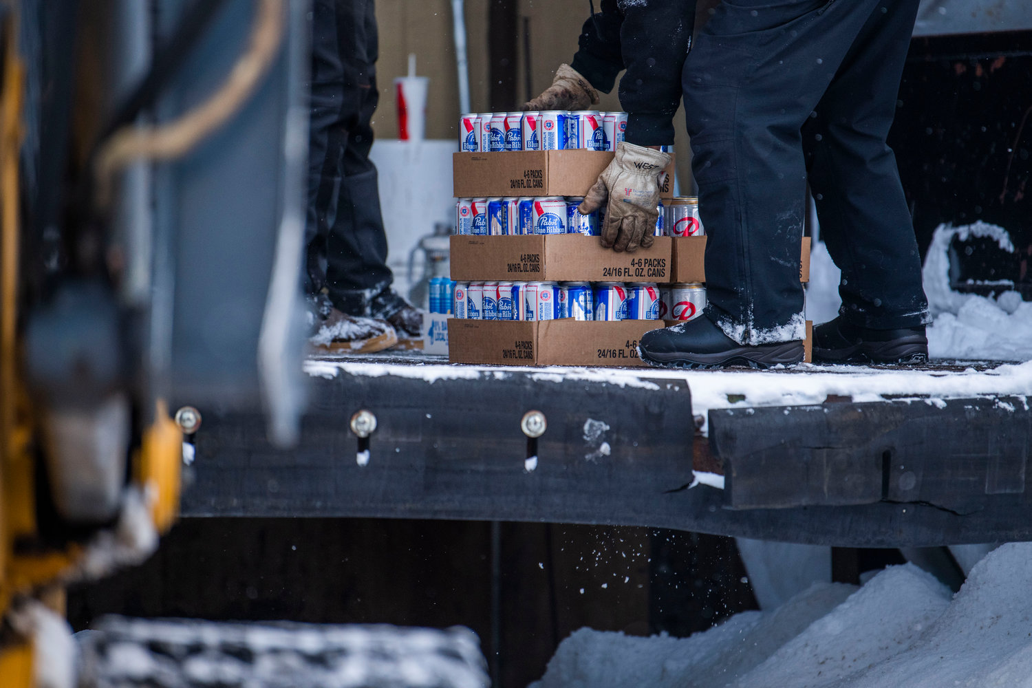 Beer is delivered to the White Pass Ski Lodge Thursday afternoon as preparations are made for opening day.