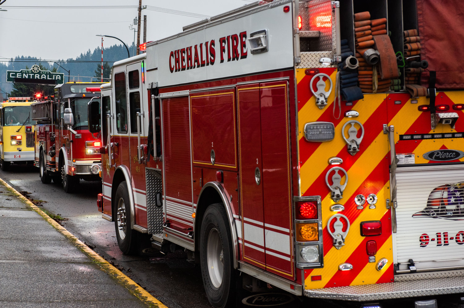 Chehalis Fire and crews from Riverside Fire Authority respond to a residential structure fire off W. Main Street in Centralia on Sunday.