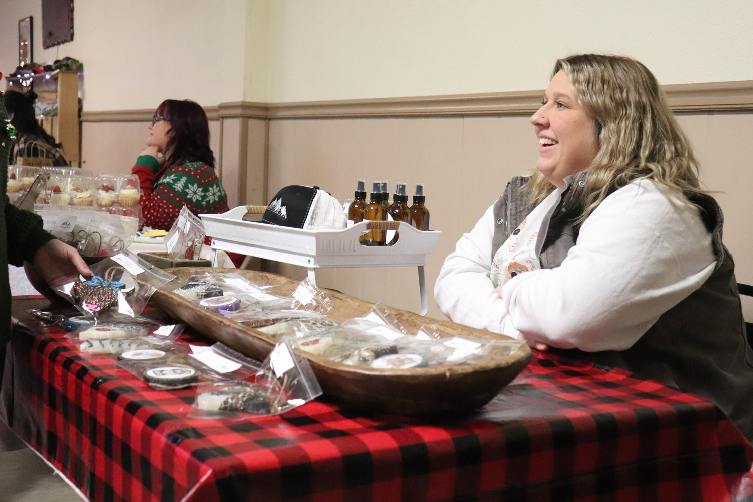 Vendors Pacific Northwest Smelly Things, Frostitution and Sugar Struck sell their wares during the Breakfast with Santa event at the Moose Family Center in Centralia on Saturday. Lewis County Work Opportunities also sold wreaths at the event.
