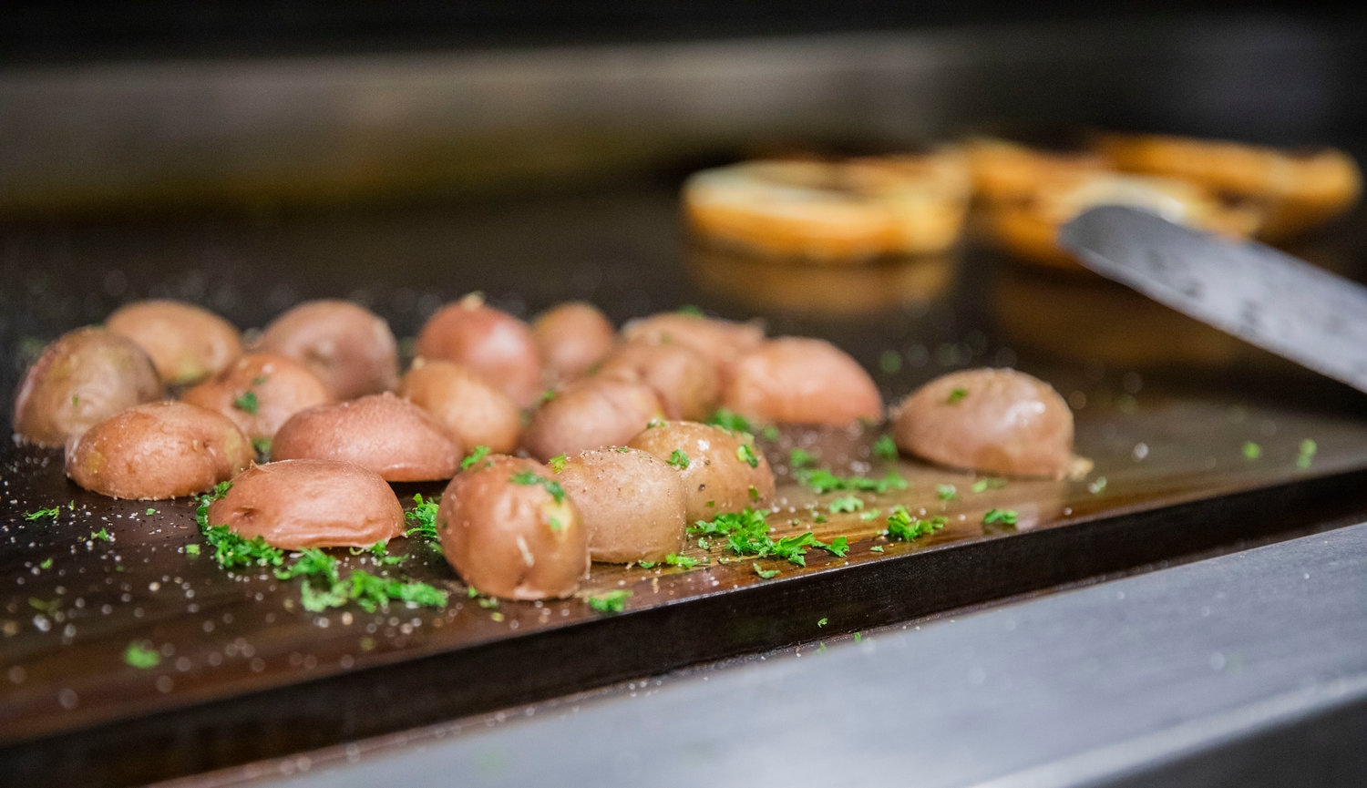 Potatoes are cooked at Ocean Prime Family Restaurant in Chehalis Monday morning.