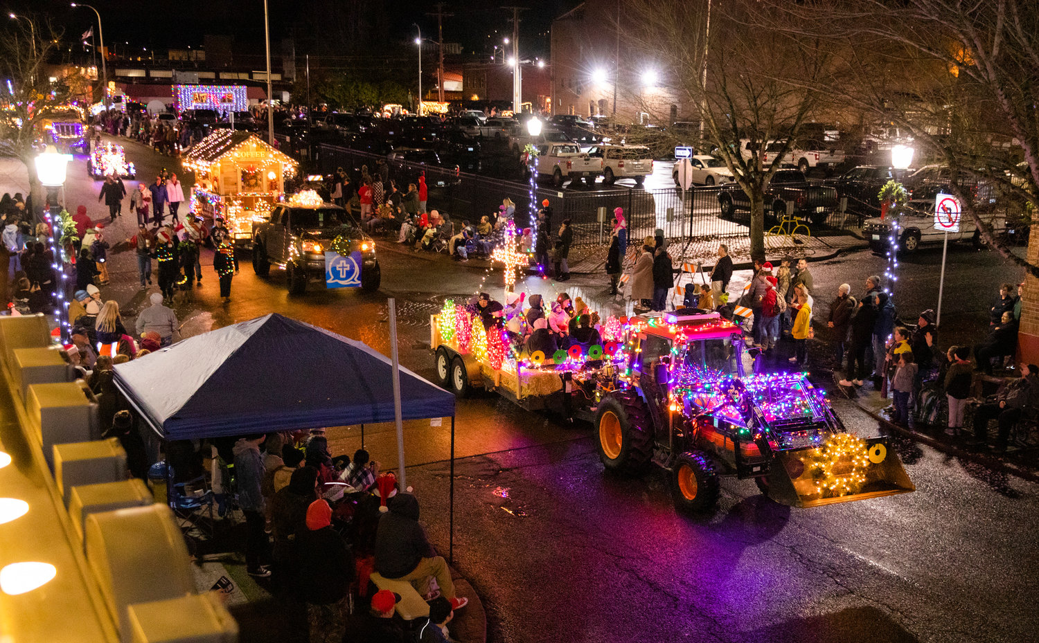 Crowds gather for the Lighted Tractor Parade Saturday night in downtown Centralia.