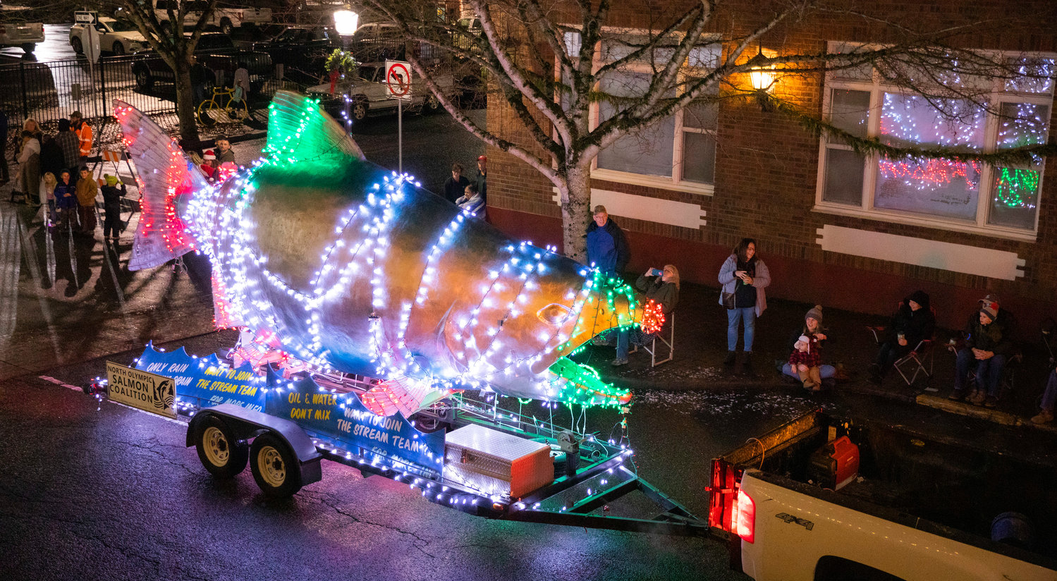 A salmon illuminates downtown Centralia during the Lighted Tractor Parade Saturday night in downtown Centralia.