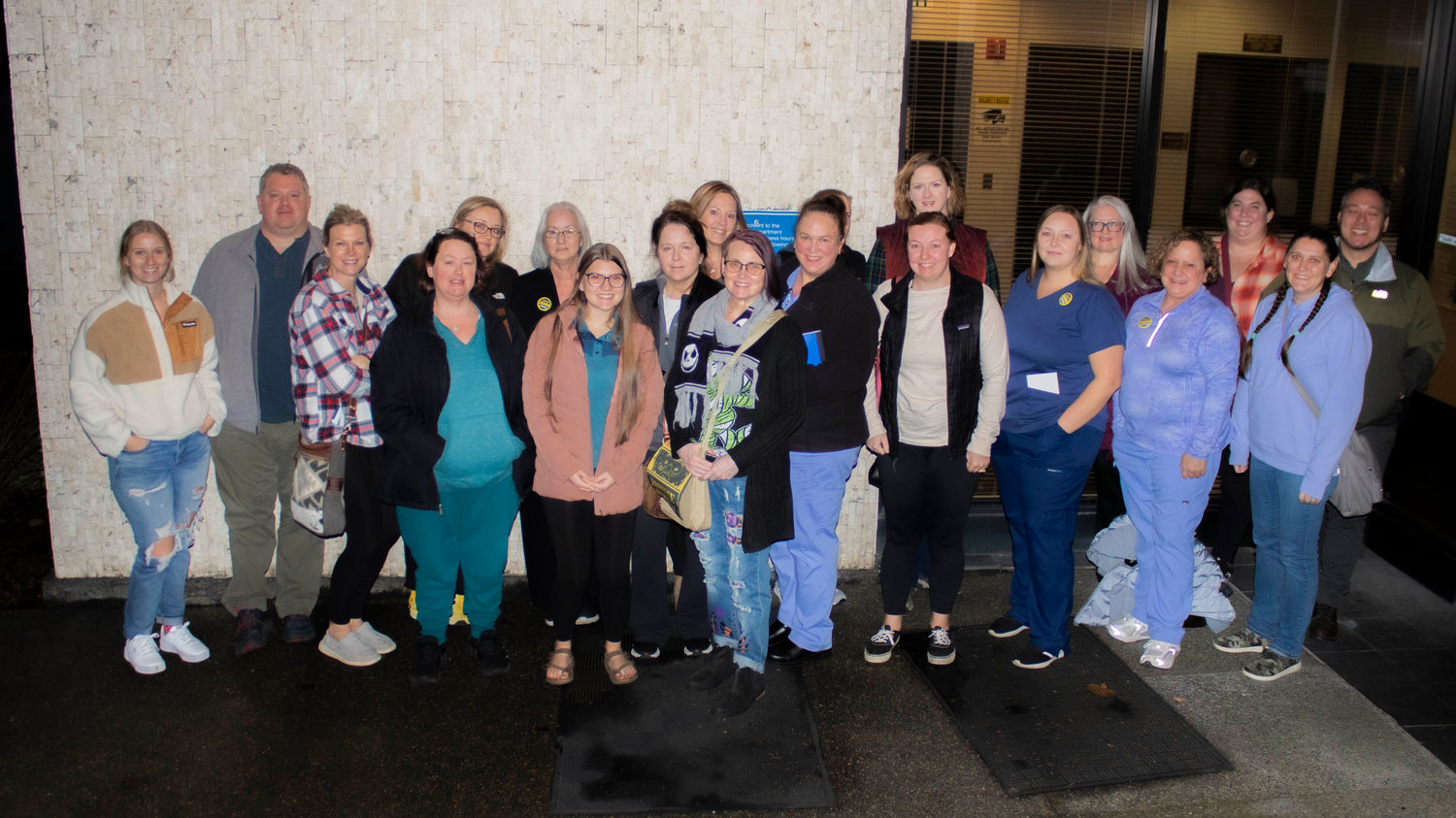 A group of nurses from Providence Centralia Hospital pose outside Chehalis City Hall after some of them spoke during the public comment period of the Chehalis City Council’s regular meeting on Monday night. The nurses asked the council for support for better staffing and addressing safety concerns.