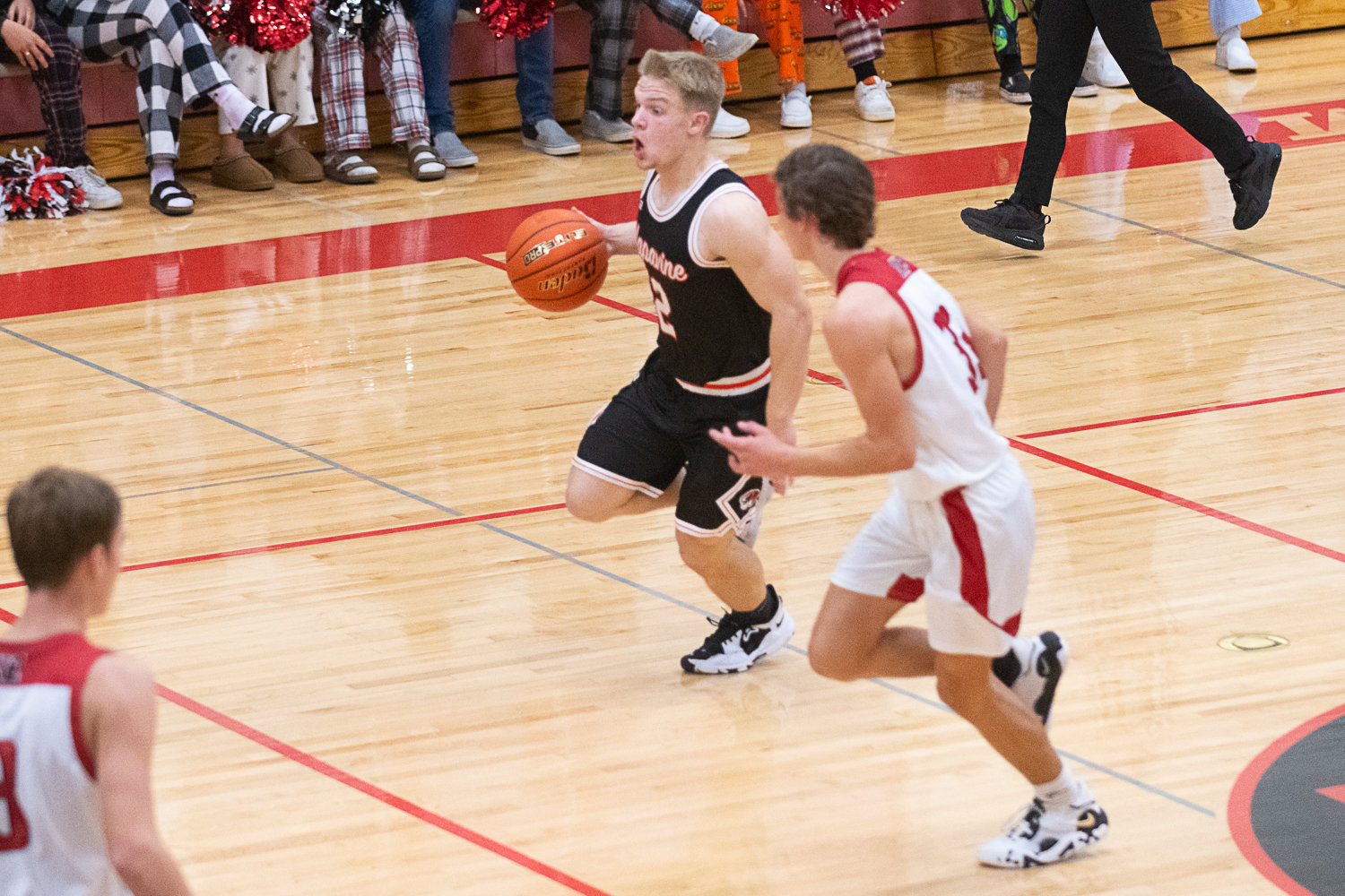 Cael Stanley dribbles up the court in during the second half of Napavine's 59-47 win over Toledo on Dec. 15.