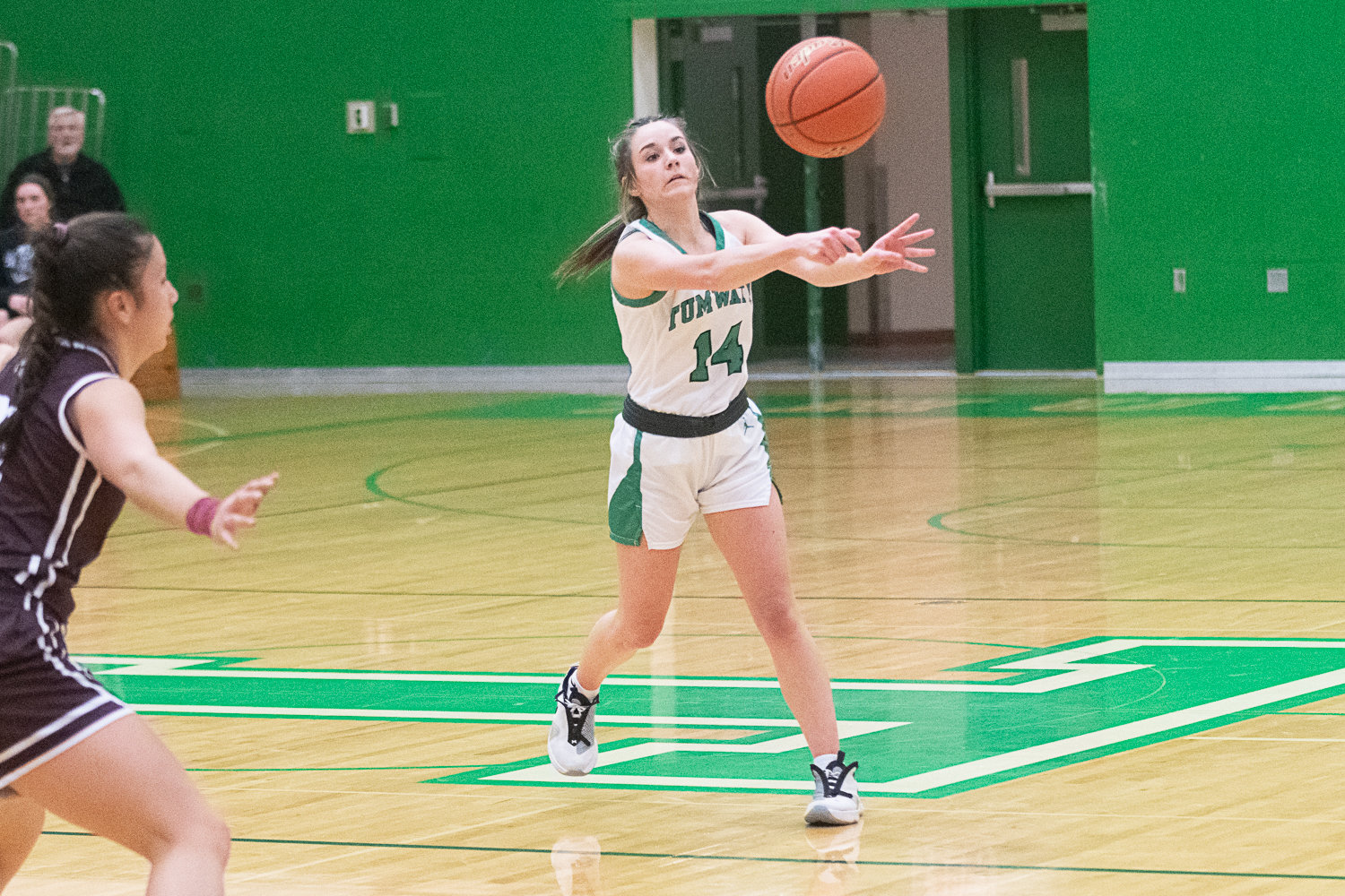 Hadley Woods fires a pass along the perimeter during the second half of Tumwater's 37-21 loss to Montesano on Dec. 22.