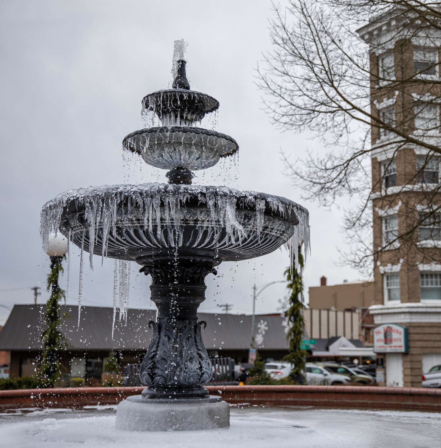Water continues to fall as icicles form on the fountain outside the Vernetta Smith Chehalis Timberland Library on Thursday.
