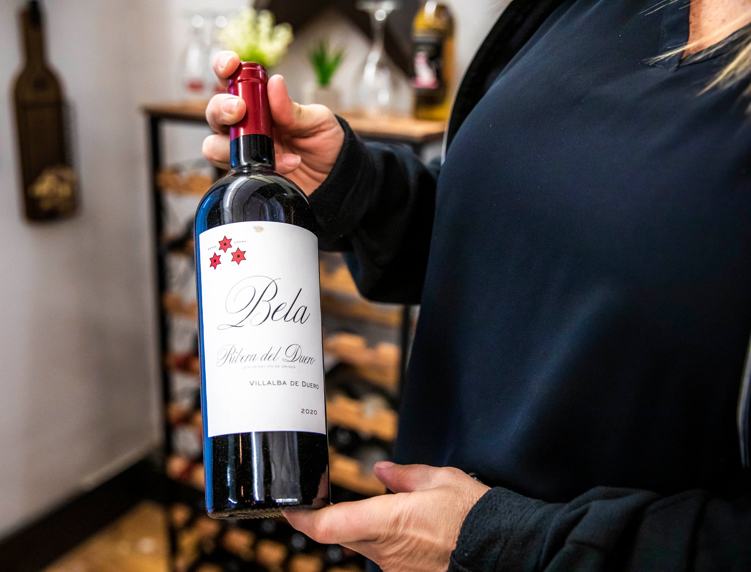 Ribera del Duero is held on display inside the Luxe Wine Bar Tuesday afternoon in downtown Centralia.