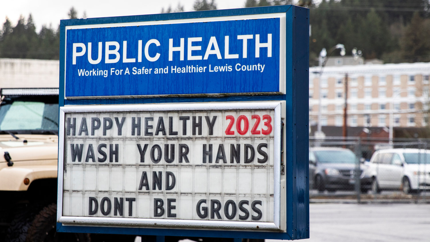 A sign sits on display outside the Lewis County Public Health building encouraging readers to “Wash your hands and don’t be gross,” in Chehalis on Monday.