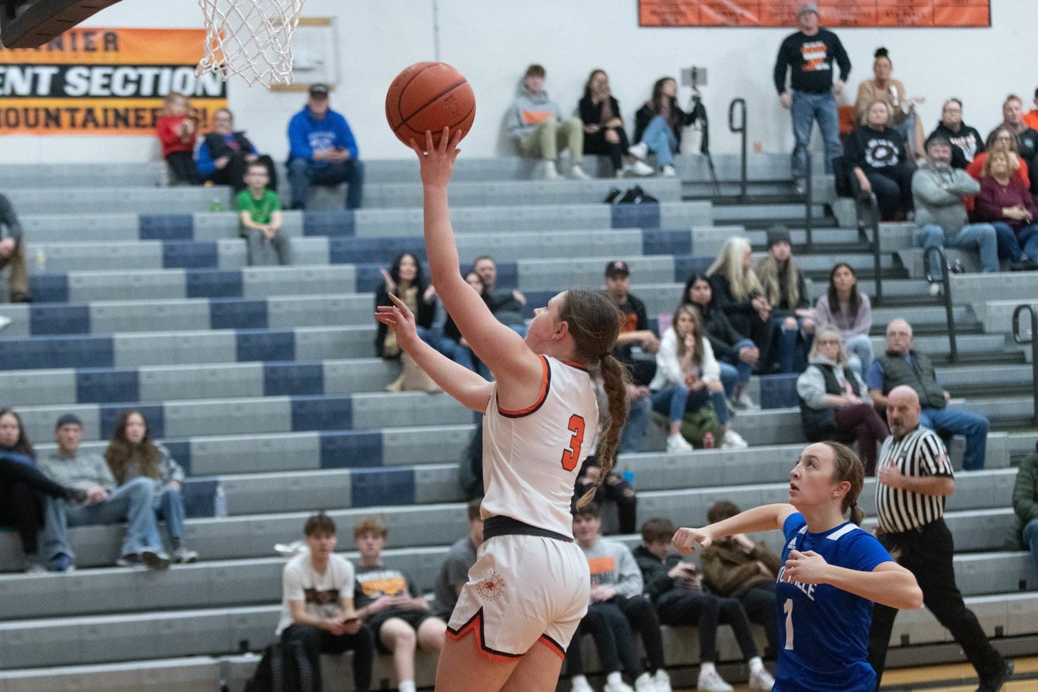 Brooklynn Swenson puts in a layup during the frst quarter of Rainier's win over Eatonville on Jan. 7.