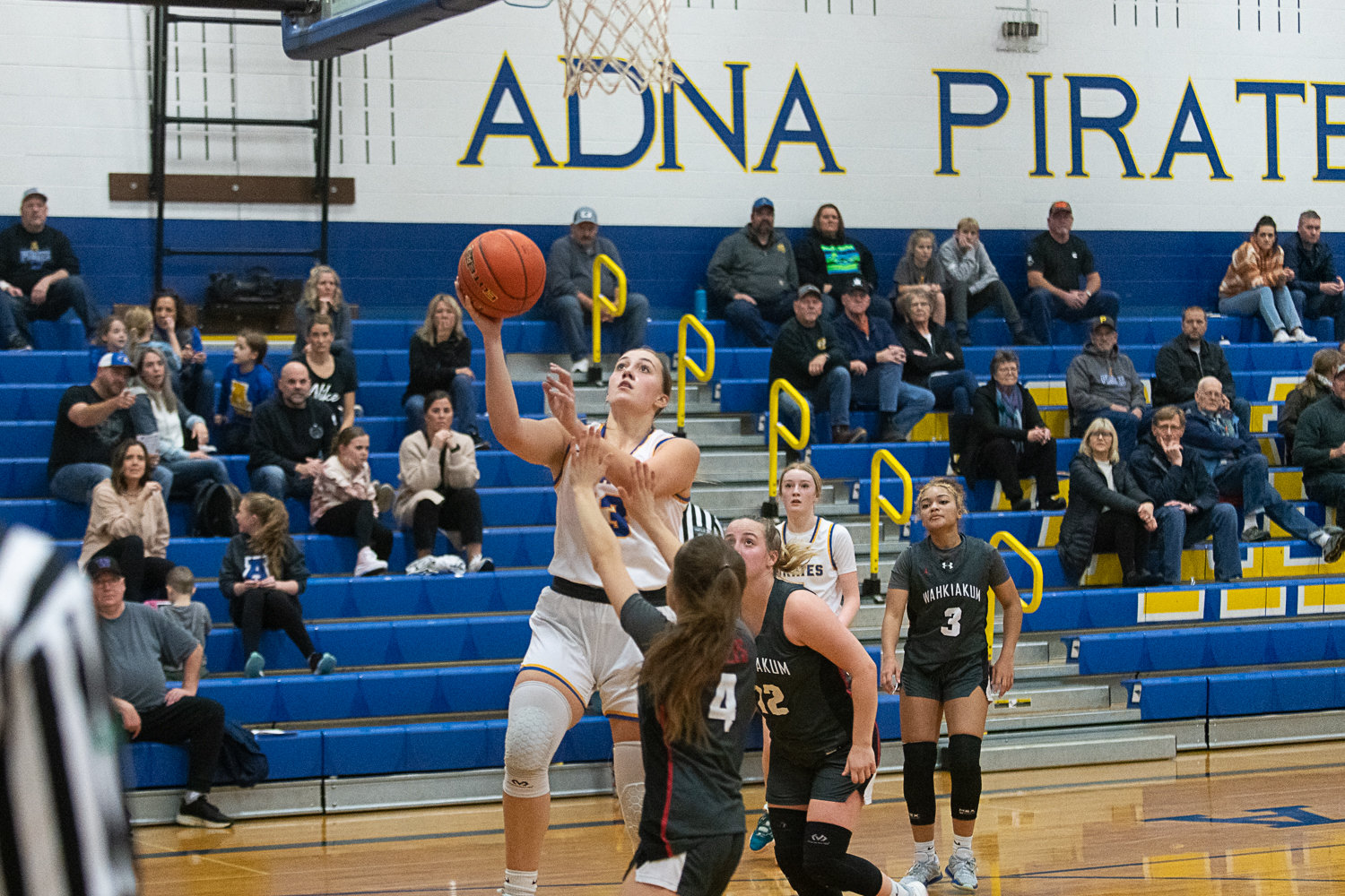 Karlee VonMoos takes a layup in transition during Adna's 72-28 win over Wahkiakum on Jan. 13.