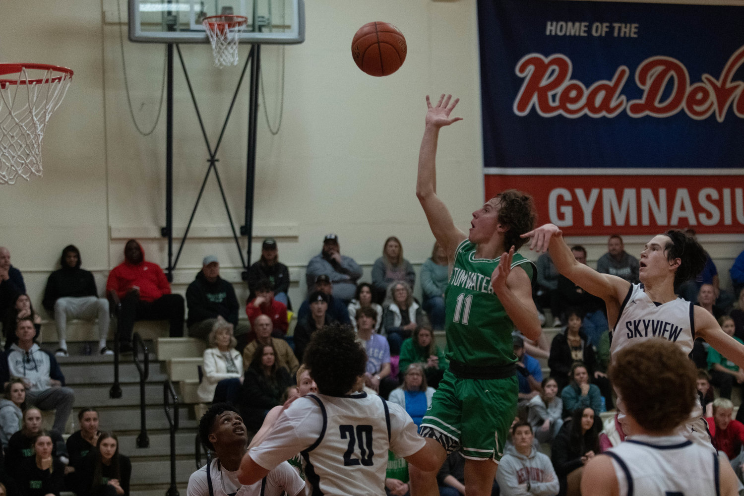 Luke Brewer puts up a floater during Tumwater's 63-61 win over Skyview on Jan. 16 at LCC's MLK Day Classic in Longview.
