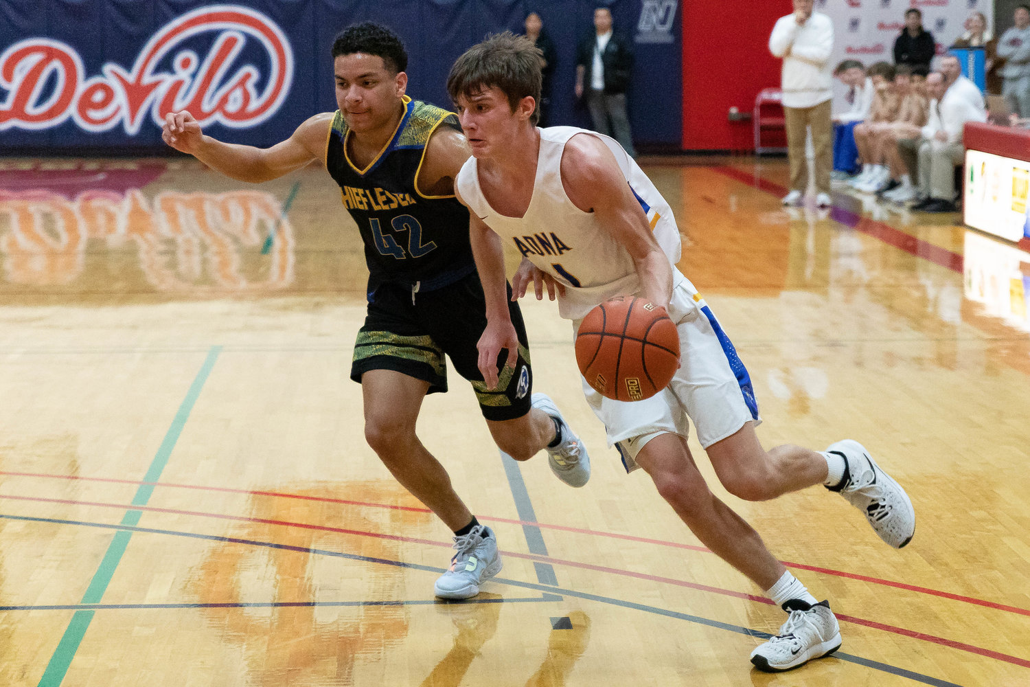 Adna guard Seth Meister drives baseline against Chief Leschi Jan. 16 at the MLK Classic at Lower Columbia College in Longview.