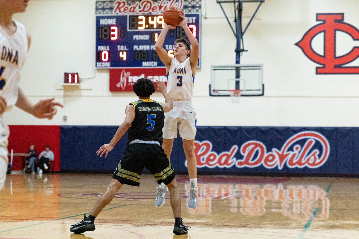 Adna guard Braeden Salme rises for a jumper against Chief Leschi Jan. 16 at the MLK Classic at Lower Columbia College in Longview.
