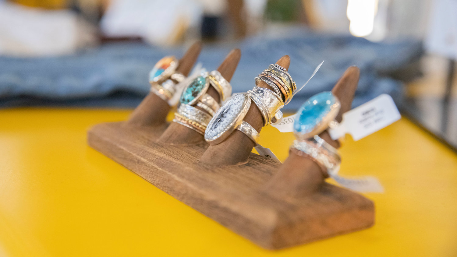 Rings sit on display at the Spruce Skin and Wax Shoppe in Chehalis on Wednesday.