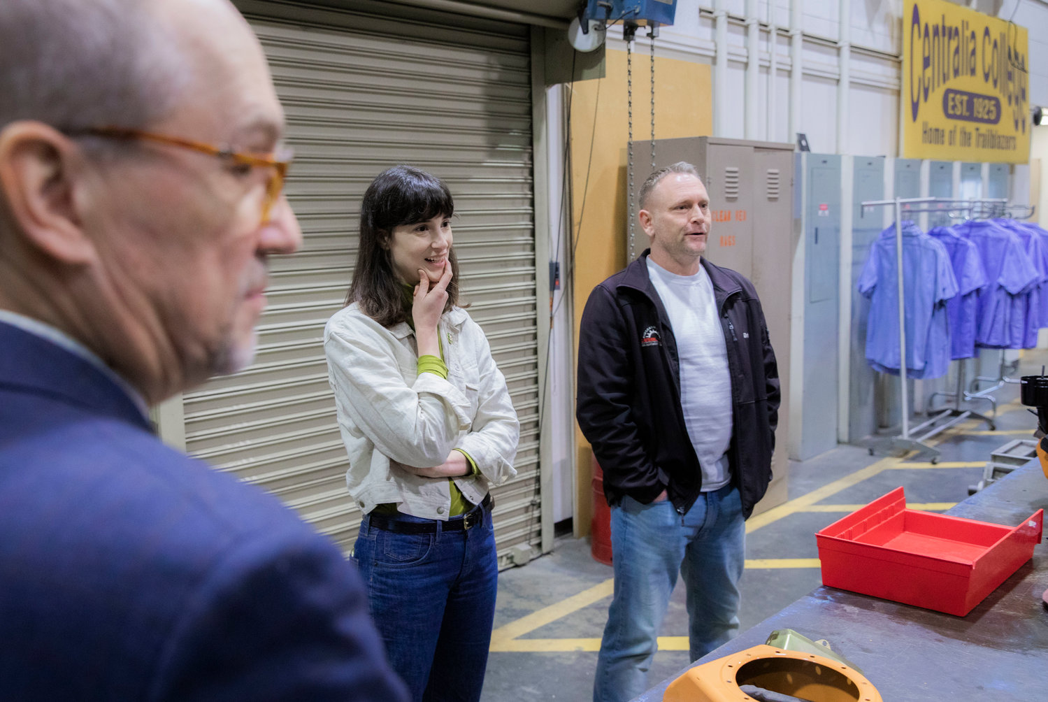 Marie Gluesenkamp Perez smiles alongside Brian Lipp, professor of Diesel and Industrial Tradesmen at Centralia College, during a tour of the campus on Friday.