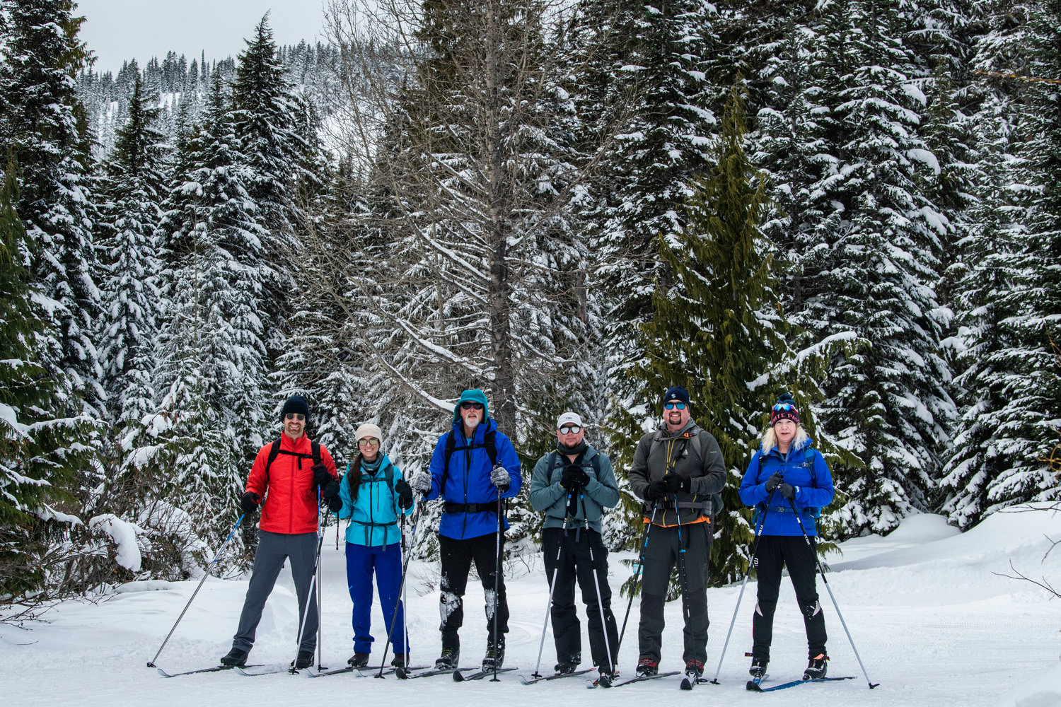 Members of the Olympia Mountaineers, from left,Thomas Harvell, Brittany Harvell, Dennis Pennell, Robbie Carrey, Scott Carlson and Christina Eudy, enjoy a day of cross-country skiing on Sunday.