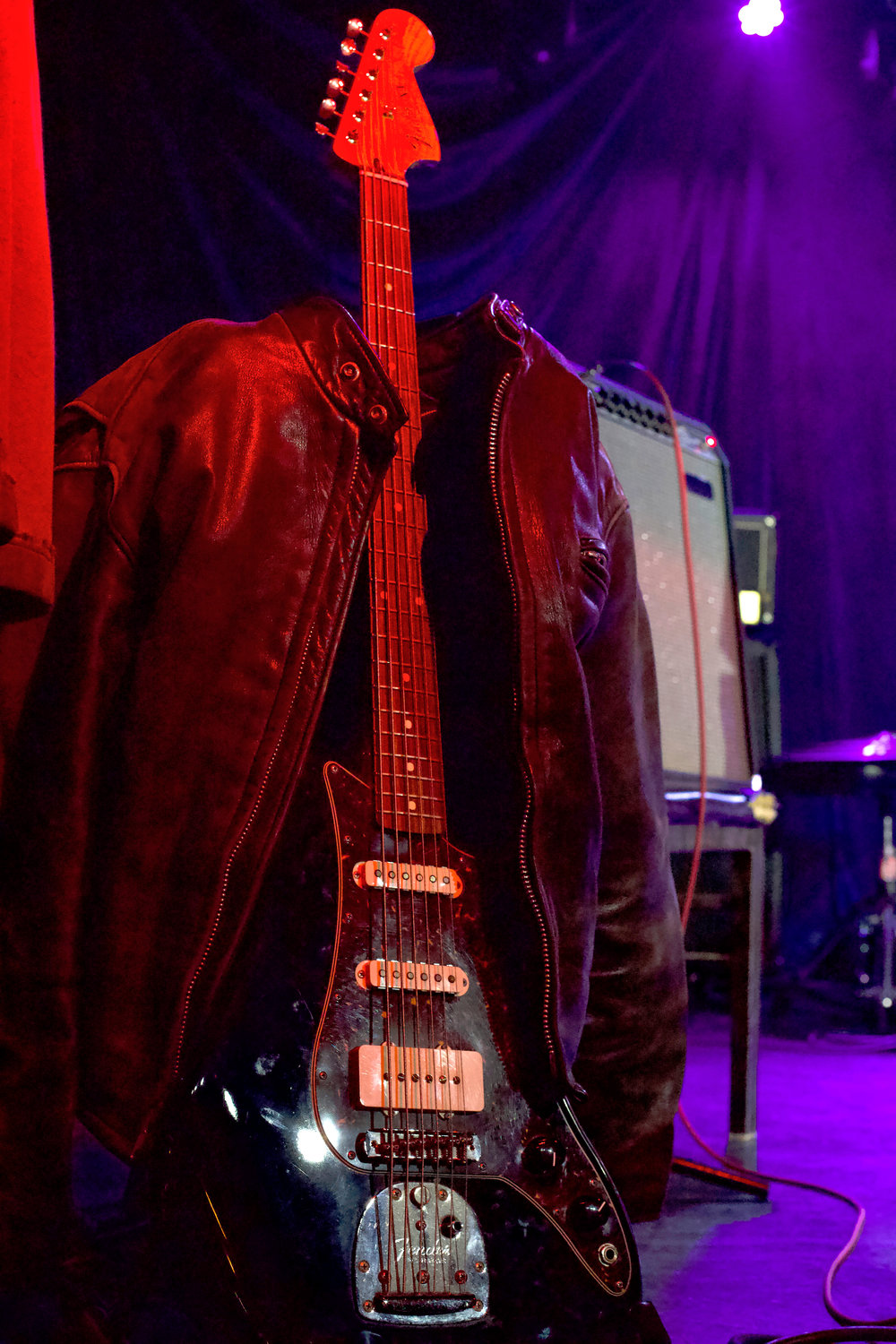 Aron Christensen’s coat rests upon his bass on stage at Dante’s during a 50th birthday celebration for Christensen at Dante’s on Friday. Christensen, who died in August at the age of 49, was a lifelong musician who helped establish Dante’s in 2000.