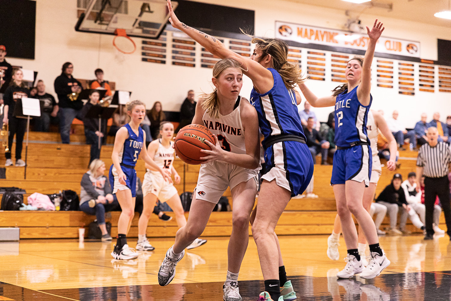 Napavine guard Hayden Kaut looks to pass from the under the basket against Toutle Lake Jan. 24.